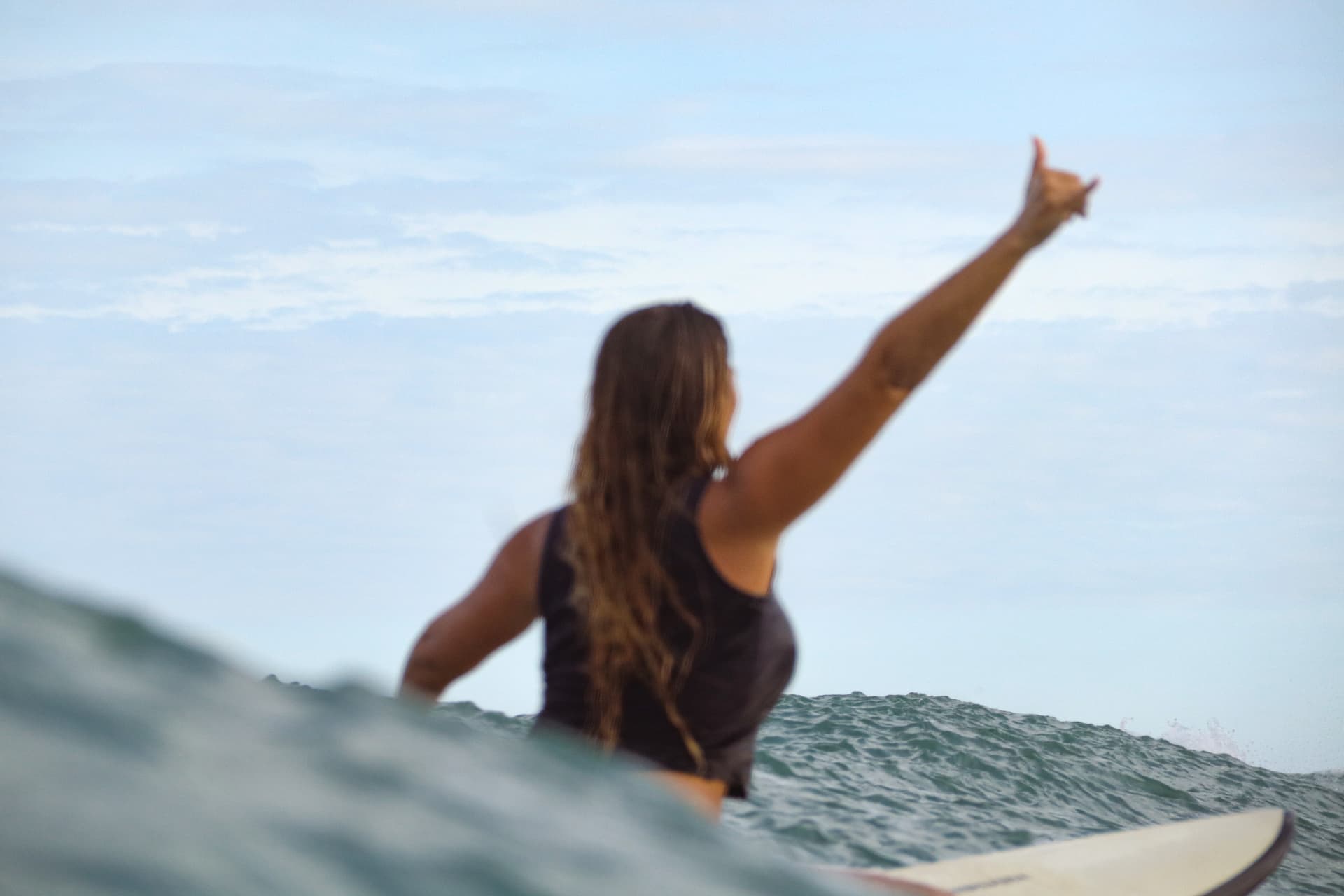 A surfer enjoying the water in Santa Teresa