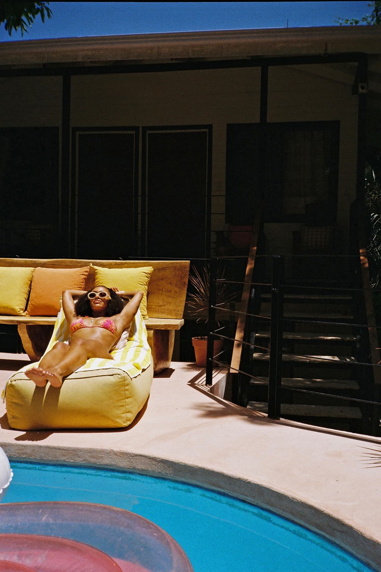 Sunbathing by the pool