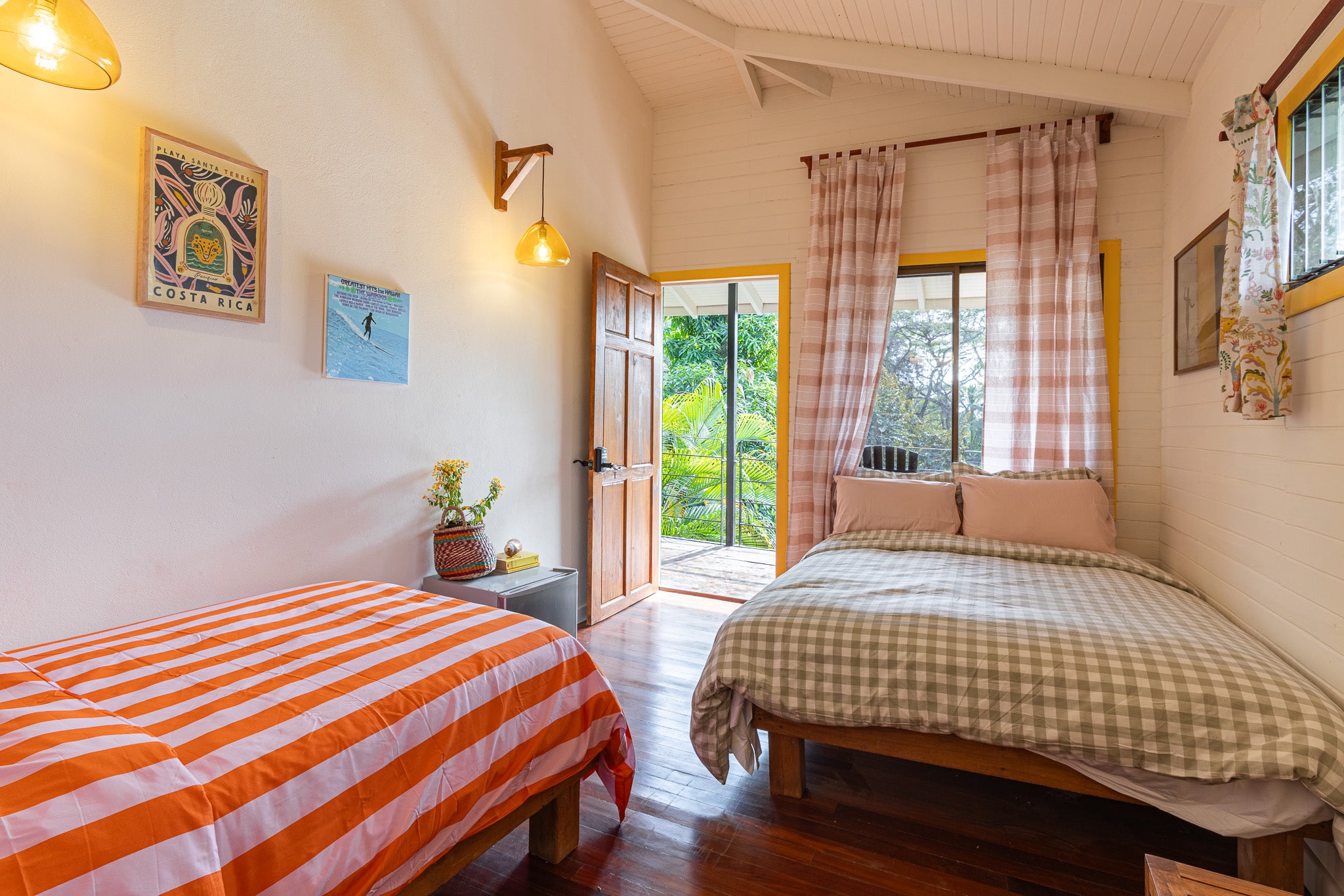 Studio Coco — Studio with double bed, striped twin bed and door to the patio