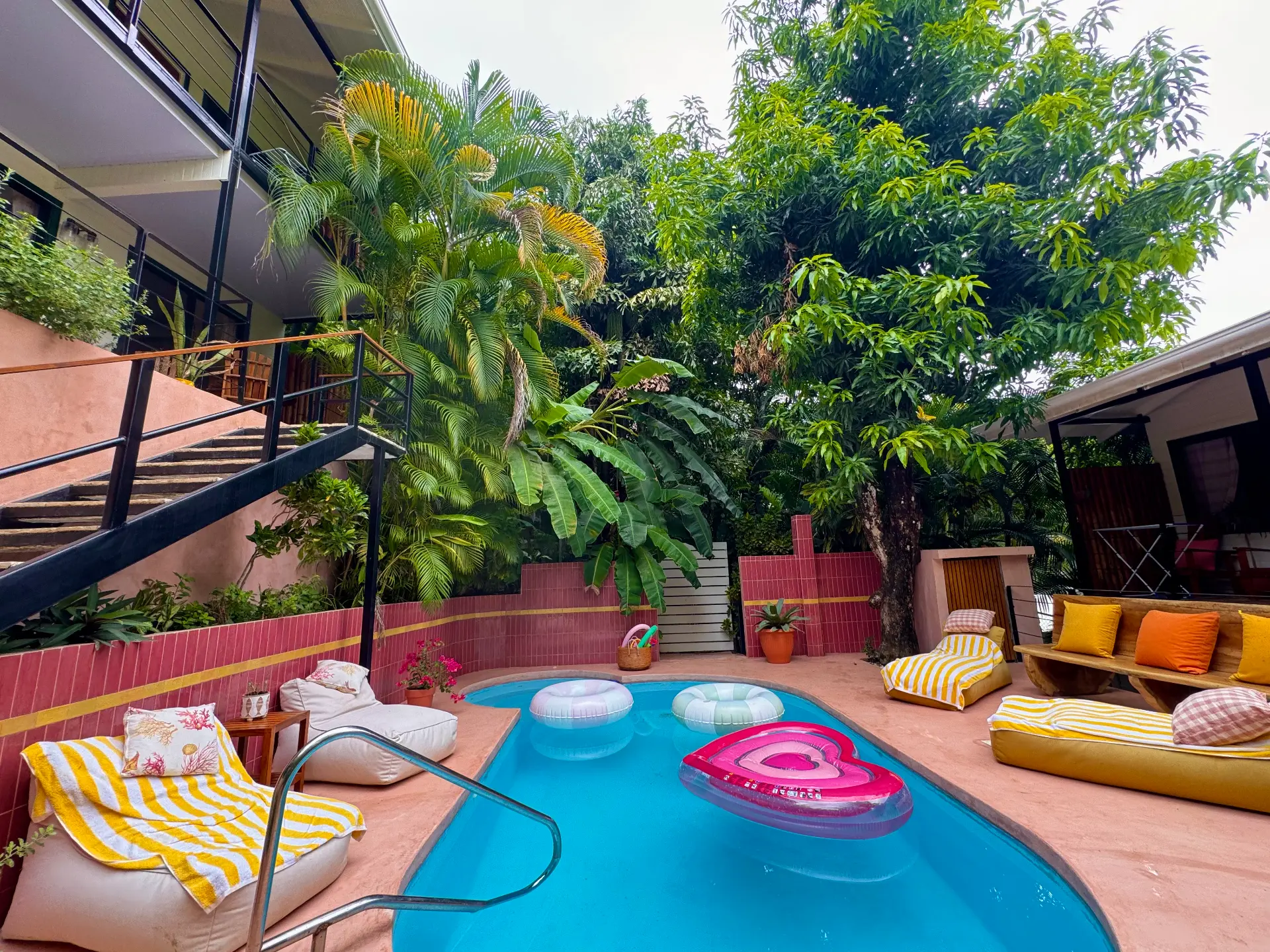 Yellow loungers around the pool